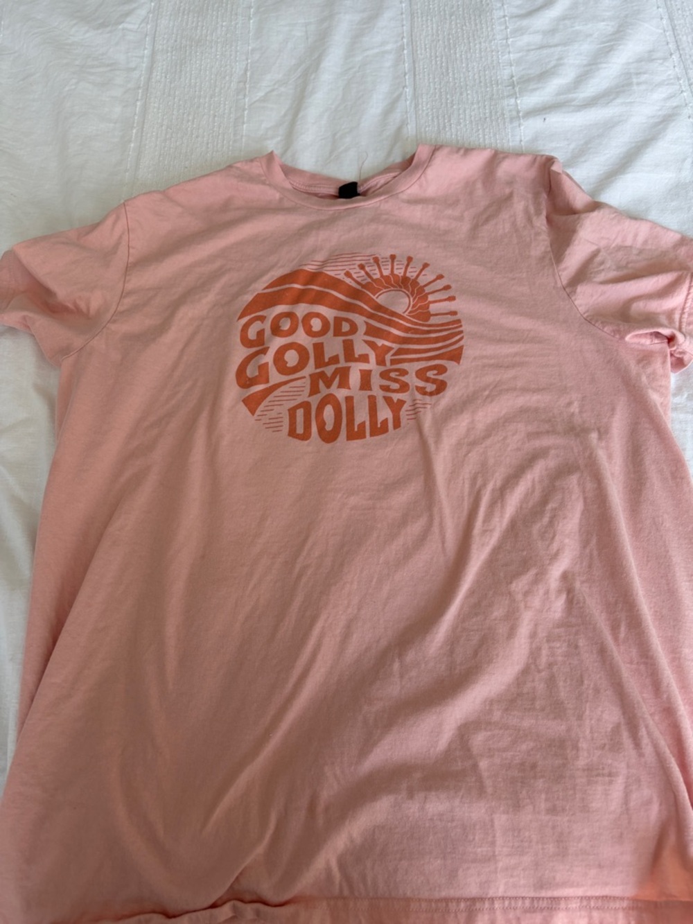 District Light Pink Tee with Orange Sunburst Graphic